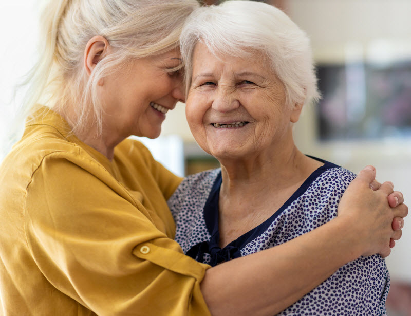 Woman spending time with her elderly mother